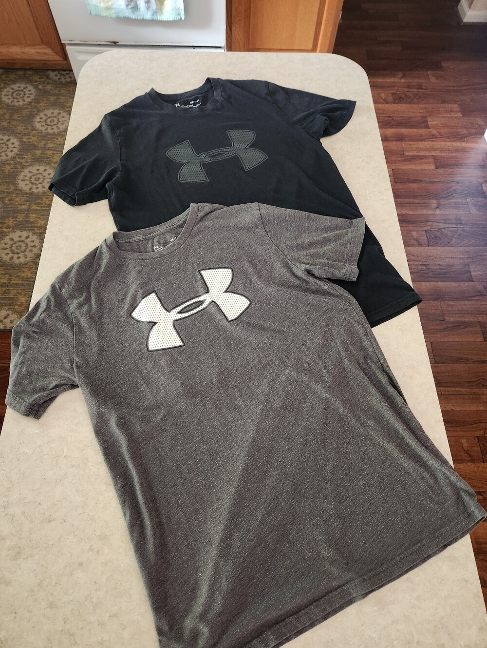 Under Armour Men’s Short Sleeve Tees in Black and Gray with Front Logo